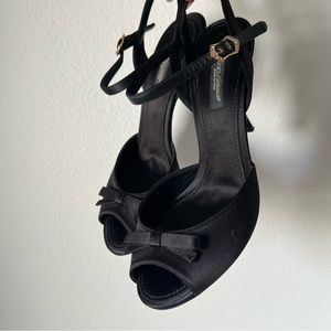 Dolce and Gabbana satin peep toe high heels.